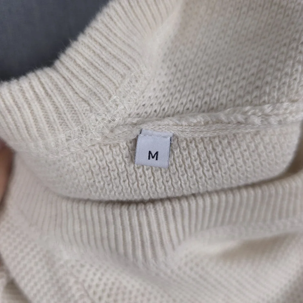 No Nationality sweater seam
