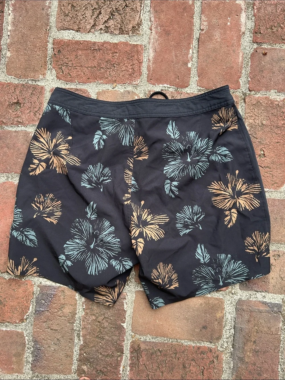 Vuori Black Swim Shorts with Teal & Tan Floral Print