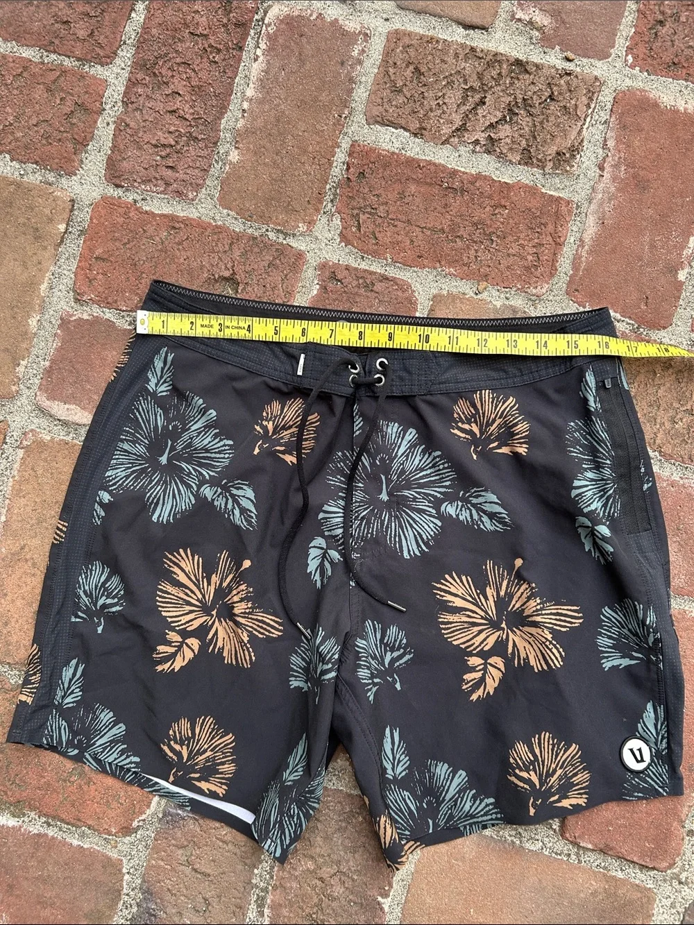Vuori Black Swim Shorts with Teal & Tan Floral Print