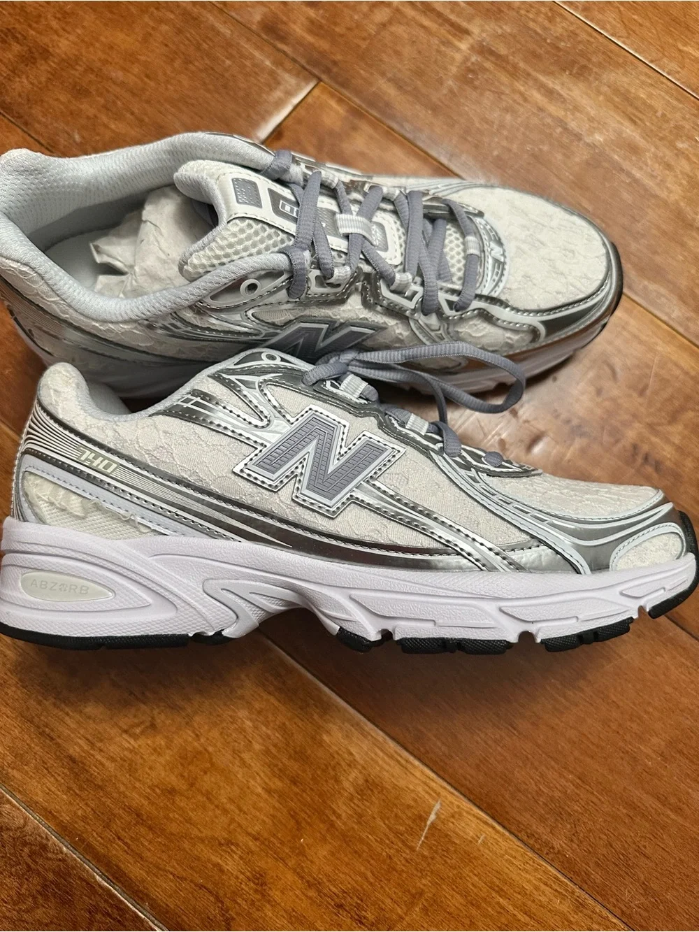 New Balance Women's Silver, White and Gray Running Sneakers