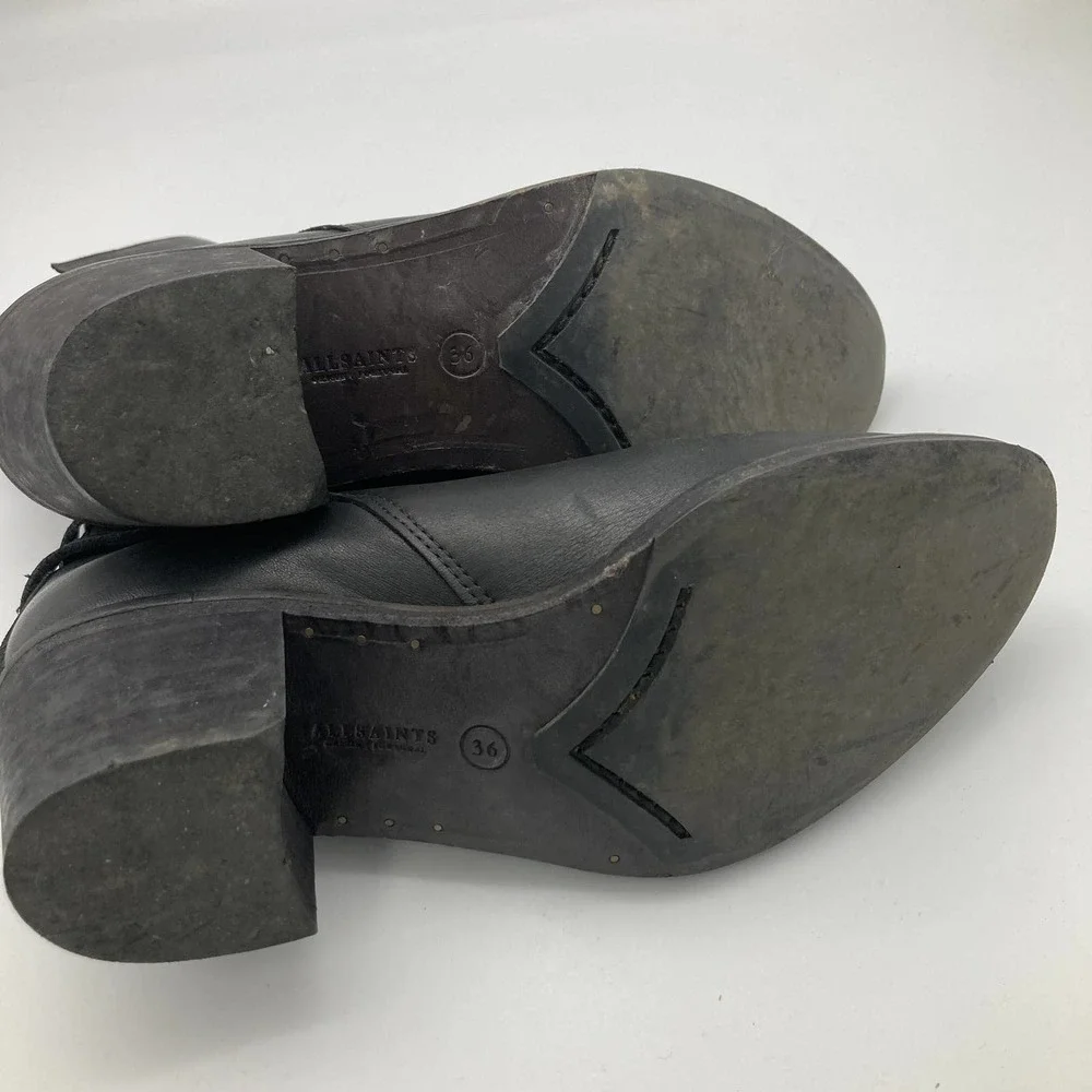 All Saints leather block