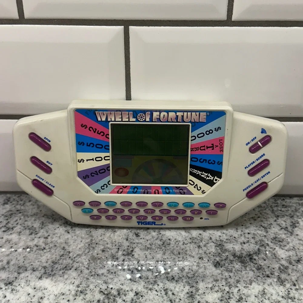 Tiger Electronics Handheld Sound Game White Wheel of Fortune Vintage 1995 Works