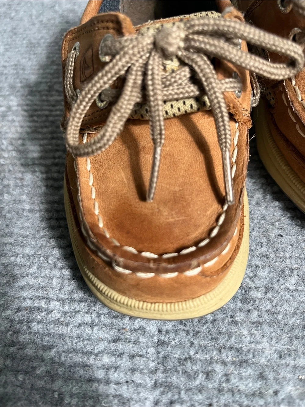 Sperry Kids Suede Moccasin Boat Shoes in Brown/Tan. Discoloration on top.0