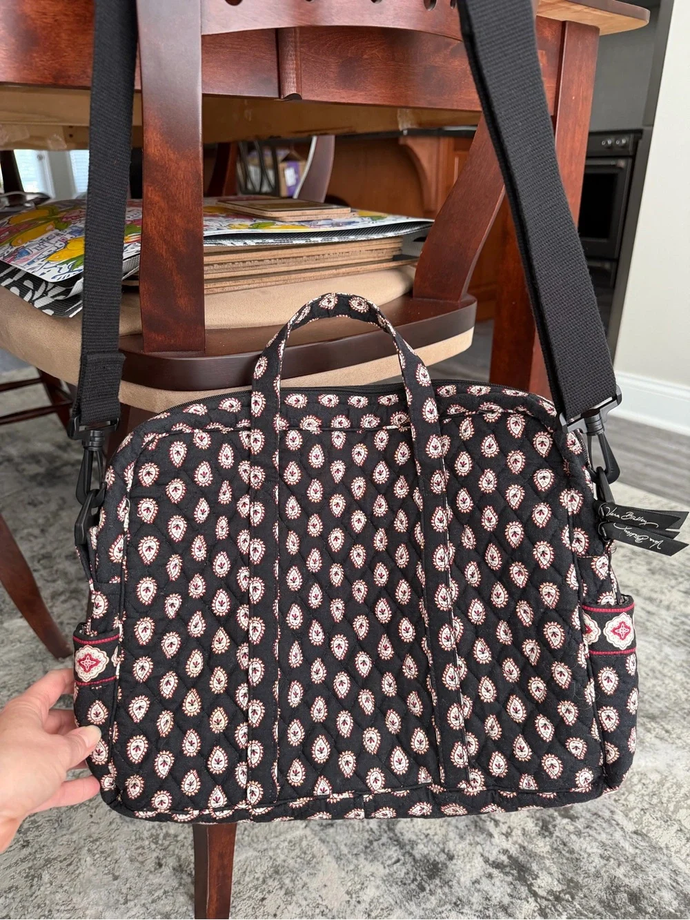 Quilted Black Vera Bradley laptop bag with adjustable strap