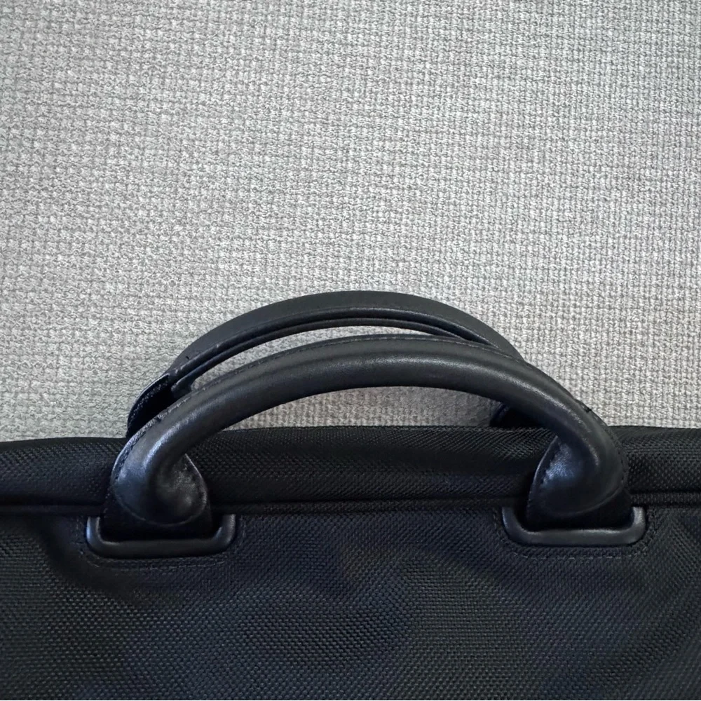 Tumi sleek black