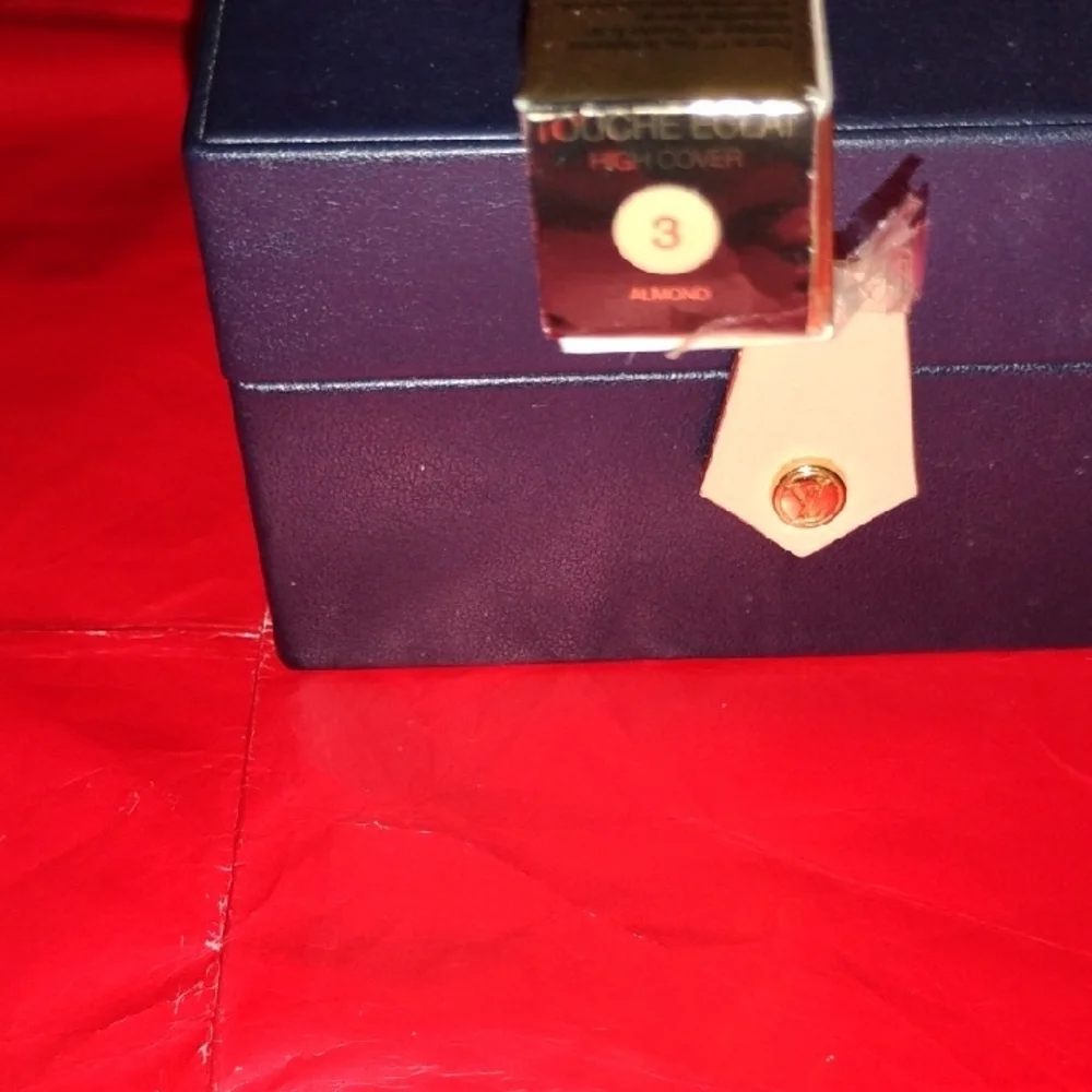 Yves Saint Laurent fine added but