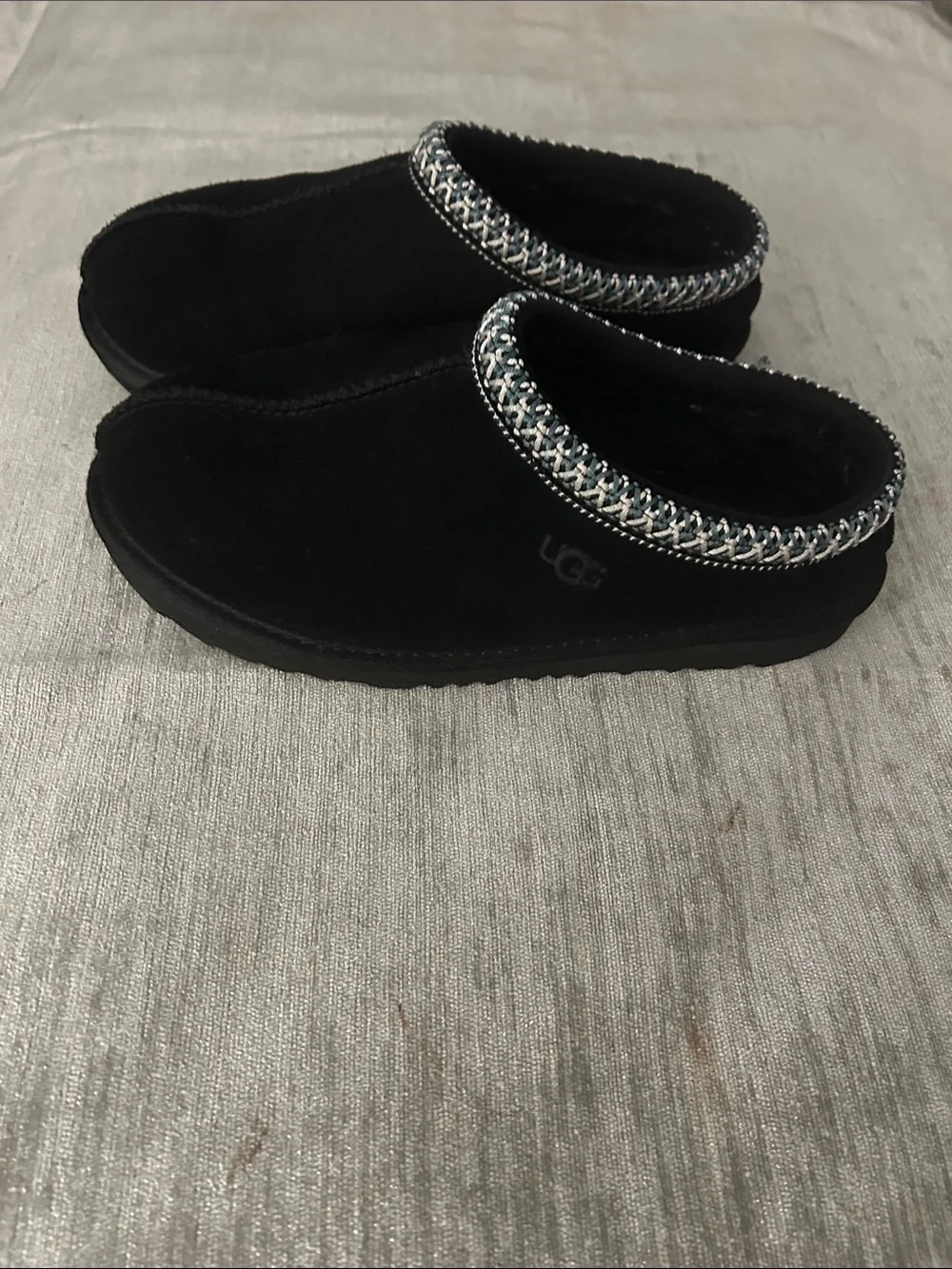 UGG Kids Black Slip-On Clogs with Silver Accent