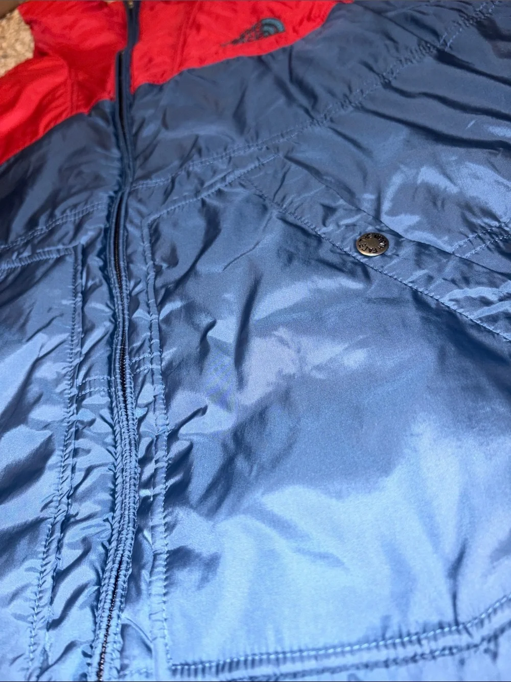 The North Face Black Quilted Vest and reversible into red and blue