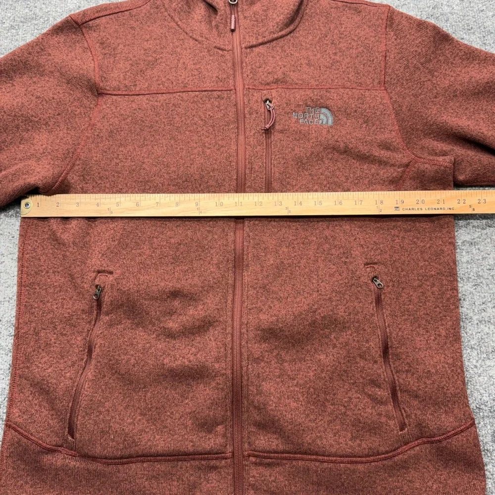 The North Face orange red outdoors