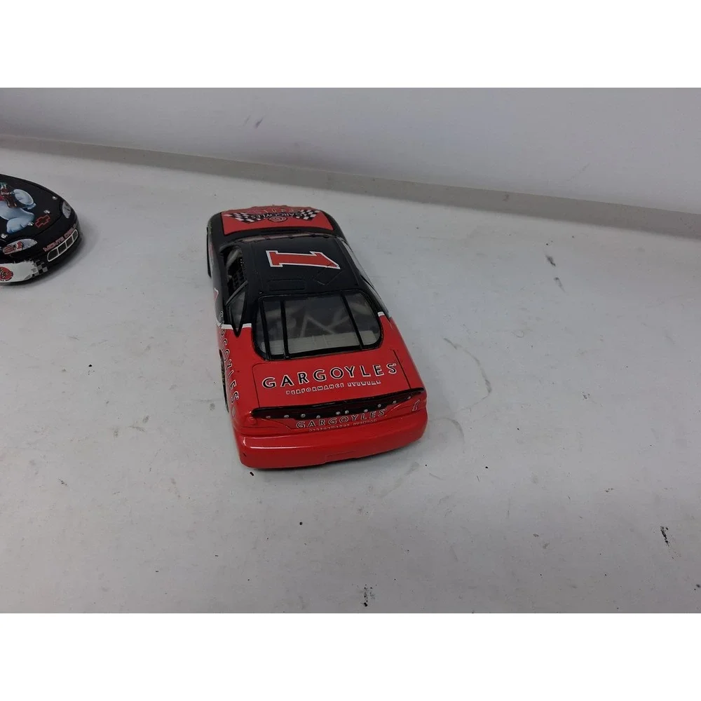 1:24 Action Dale Earnhardt/Coca Cola 1998 Monte Carlo + 1997 Gargoyles Pontiac H