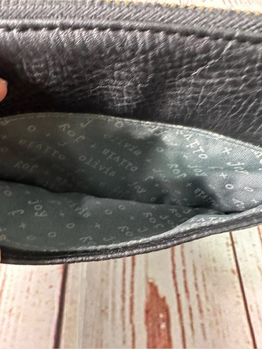 Olivia + Joy Black Pebbled Leather Wristlet Clutch with Gold Logo