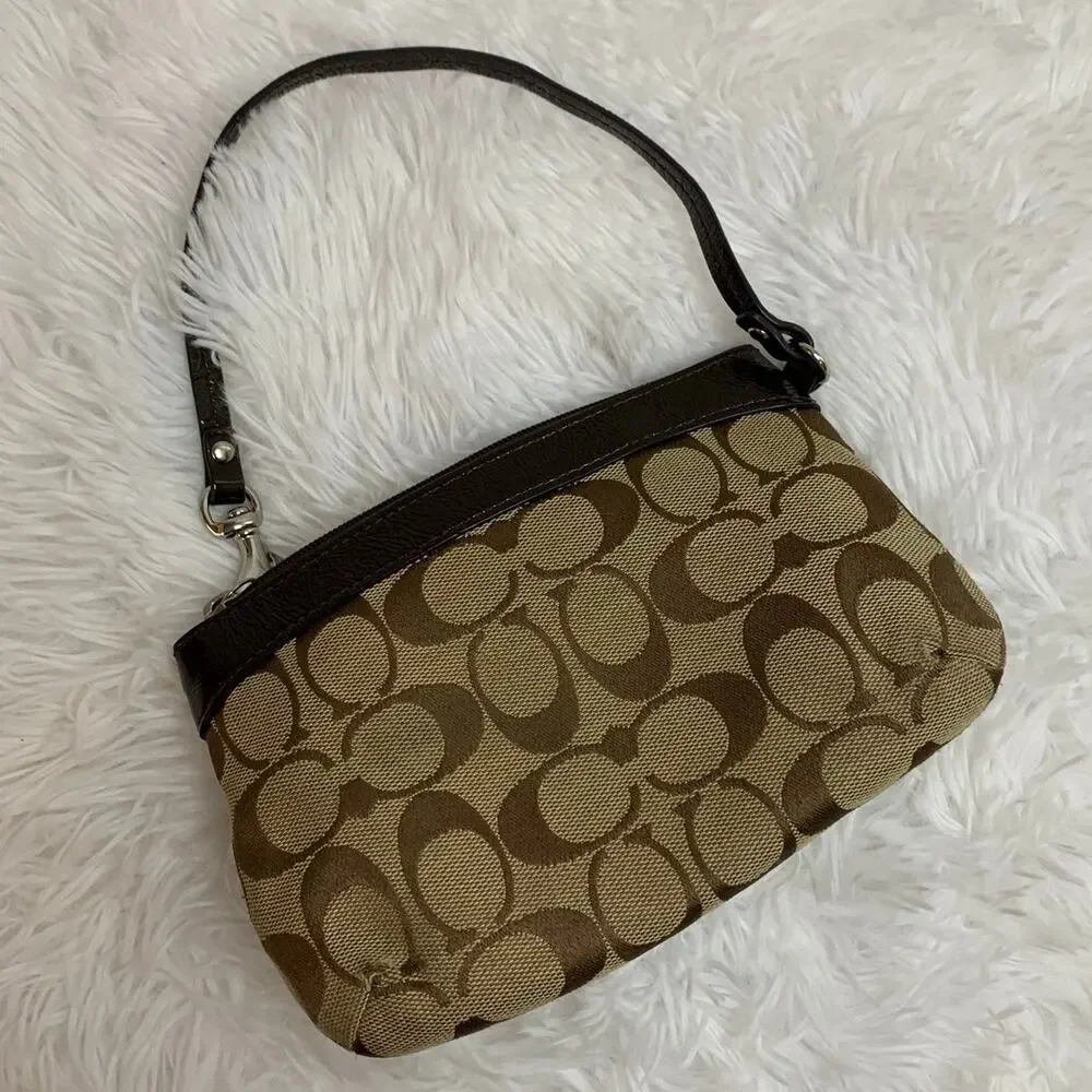 Coach brown wristlet