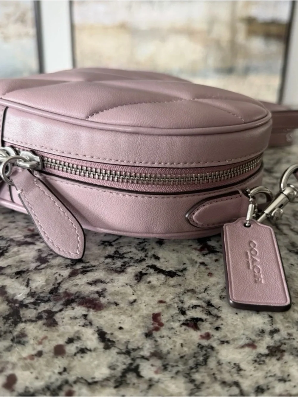 Coach quilted heart
