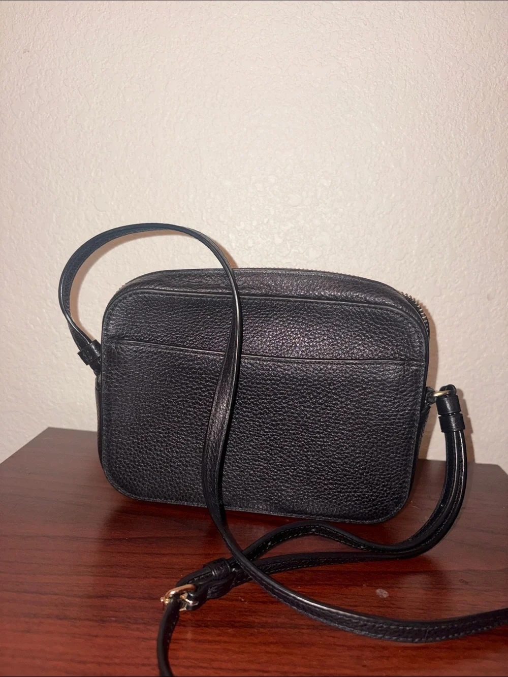 Coach compact pebbled
