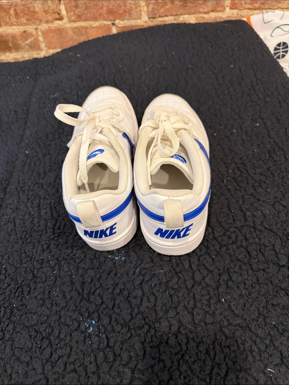 Nike Kids White Sneakers with Blue Swoosh