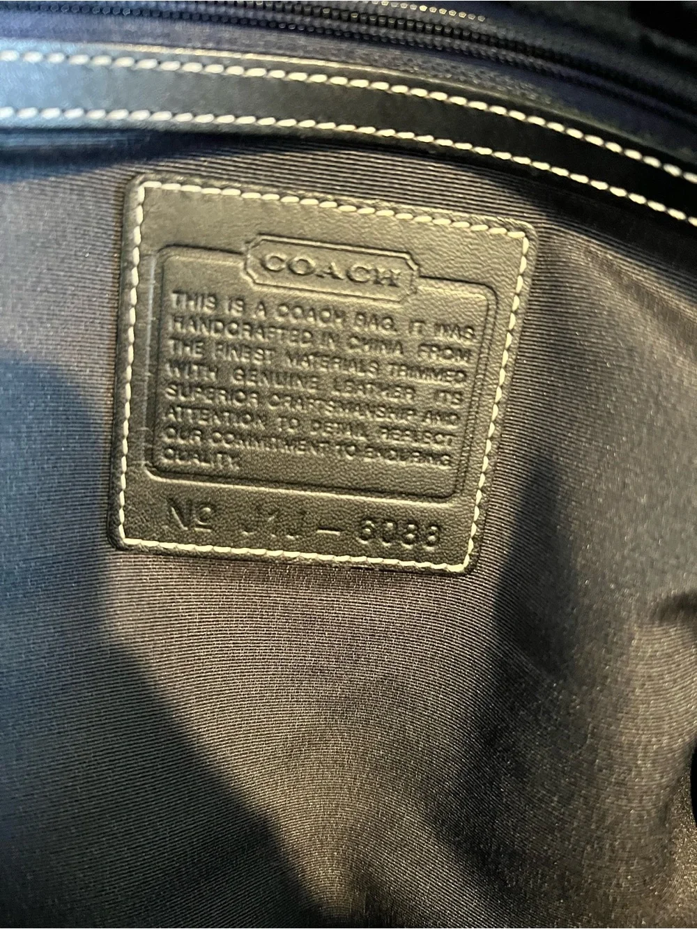 Coach black signature