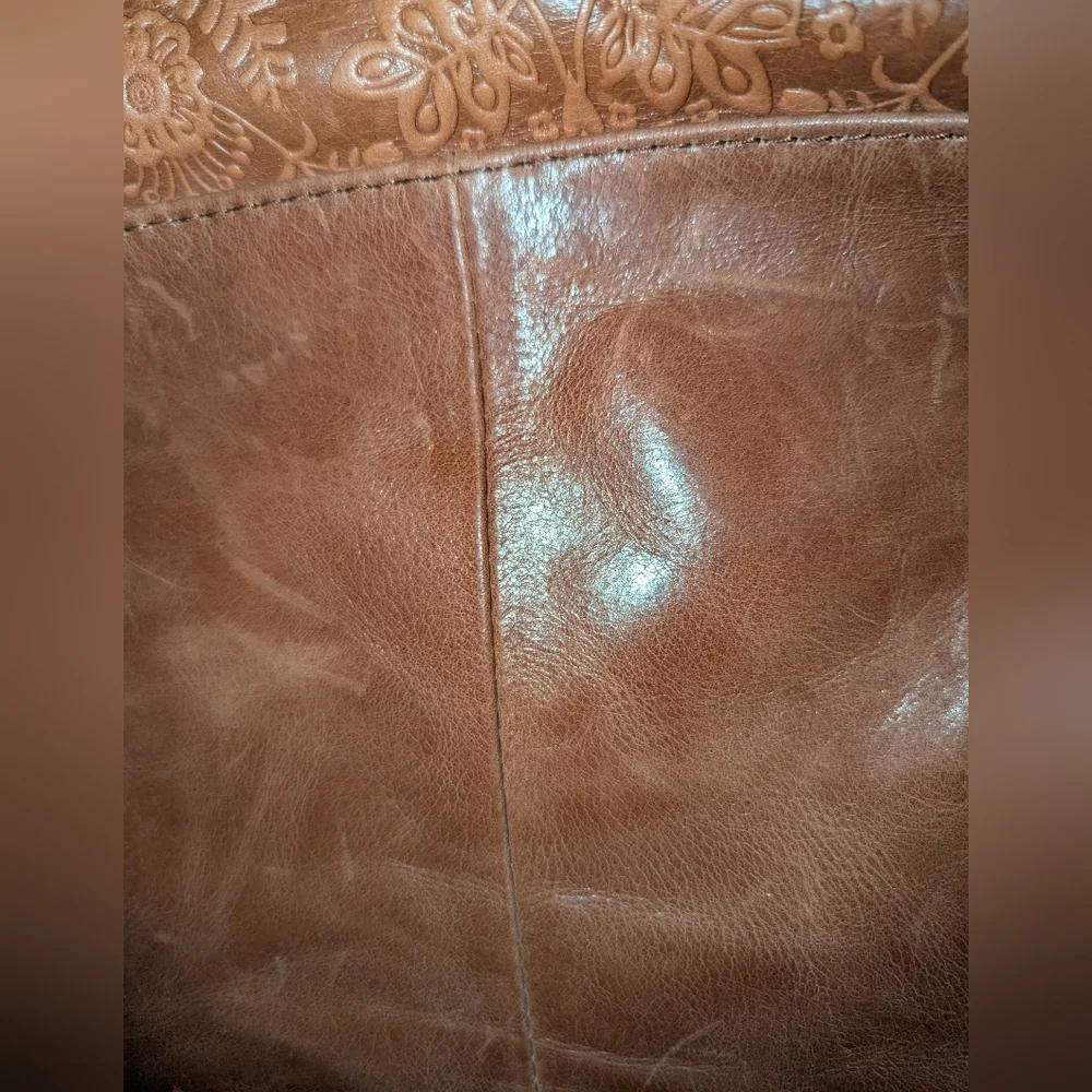 The Sak Ventura Convertible Tan Embossed Leather Backpack