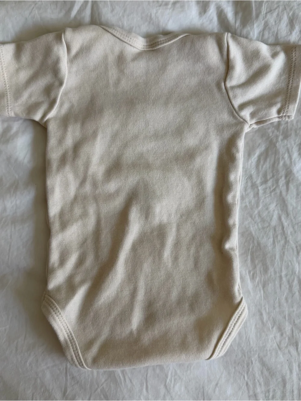 N/A beige onesie