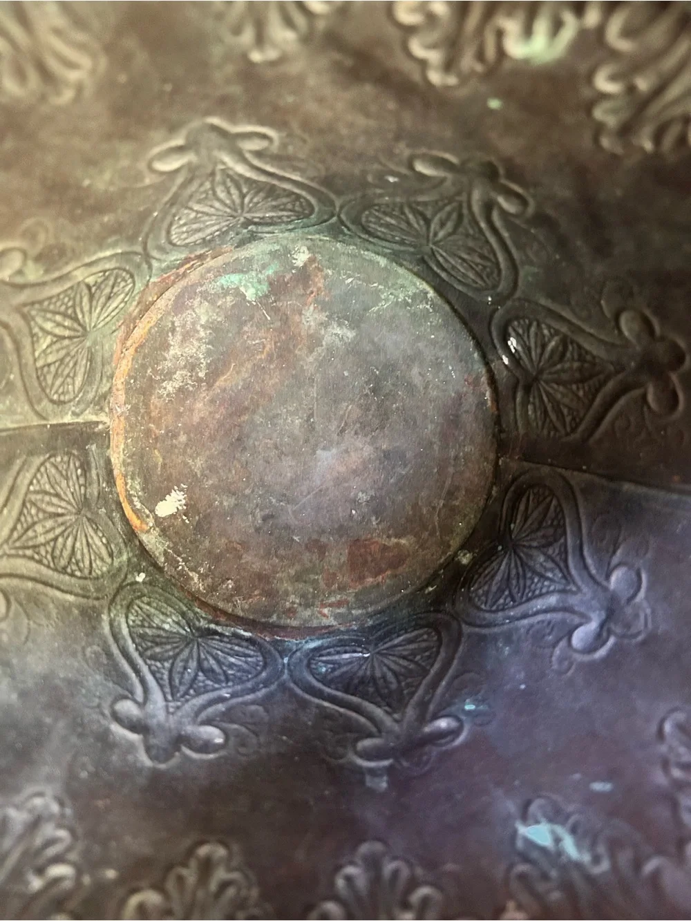 Vintage embossed brass