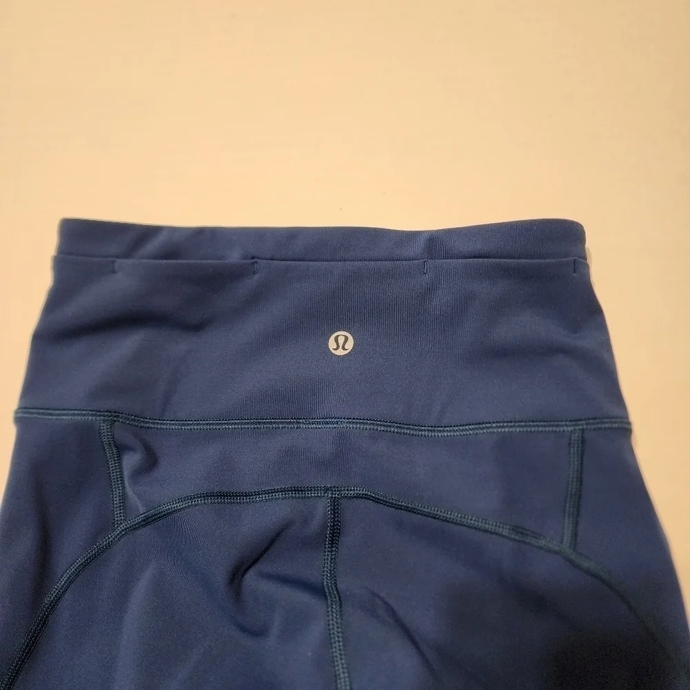 Lululemon size 2 Gear up blue Poseidon cropped leggings with sheer accents