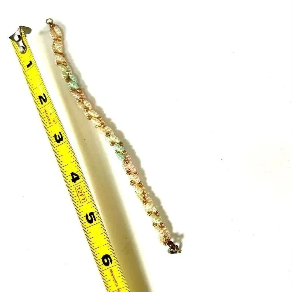 Faux pearl twisted multi strand bracelet faux pearl
