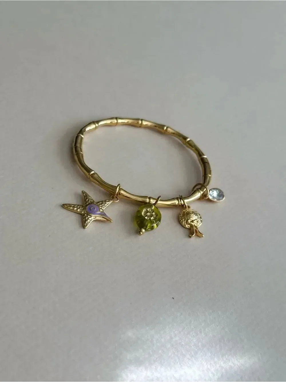 Anthropologie elegant gold