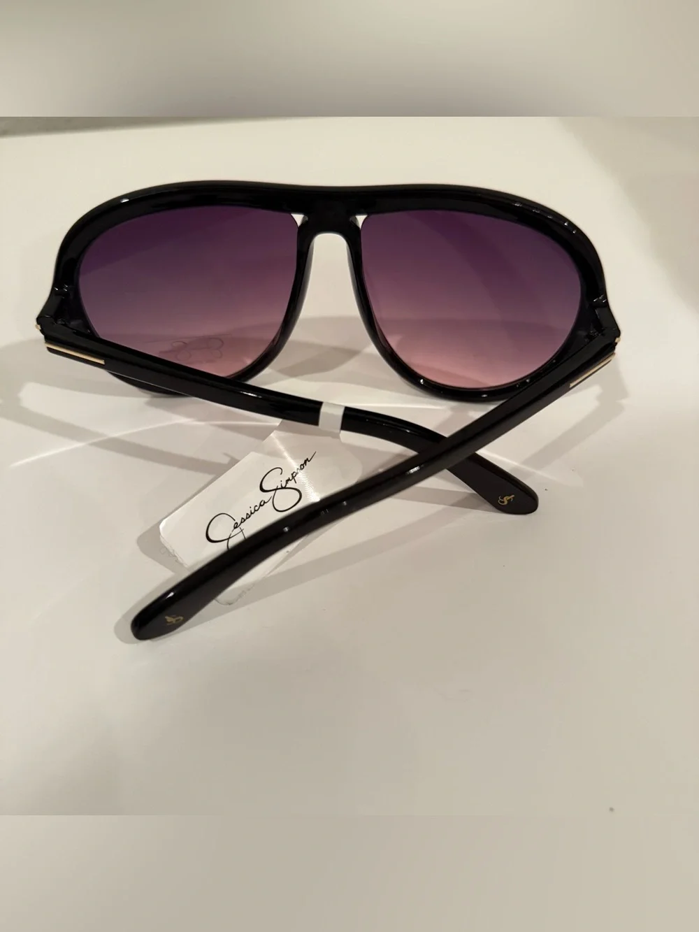 Jessica Simpson temple glossy