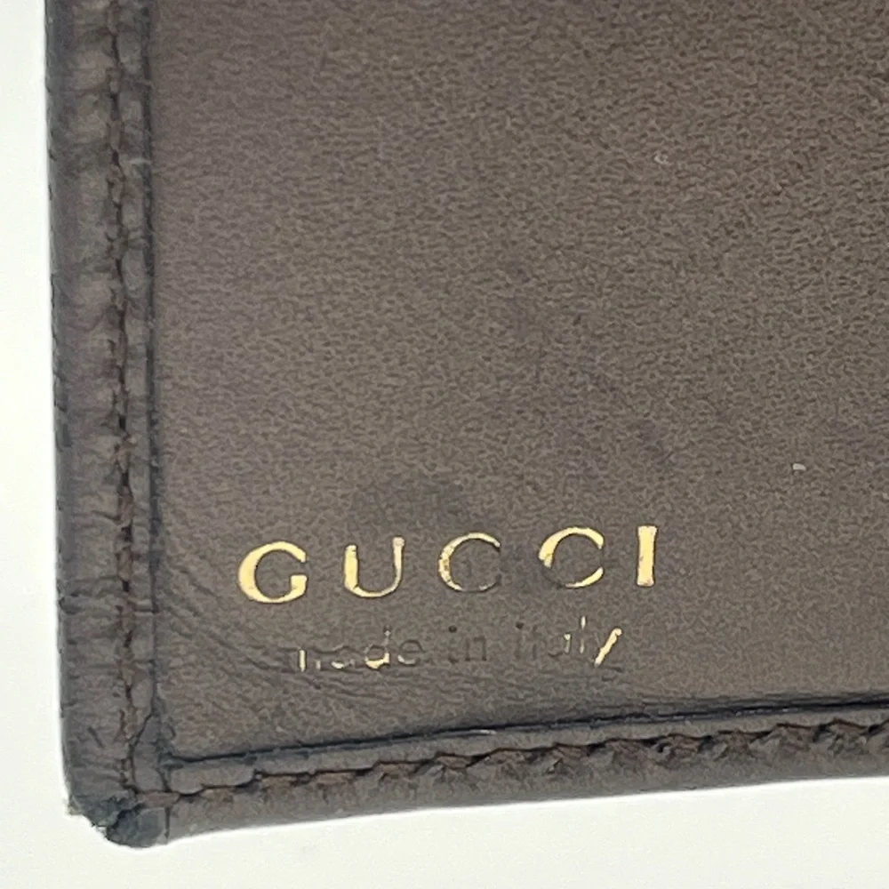 Gucci Brown Leather Wallet with Gold “G” Initial Clip