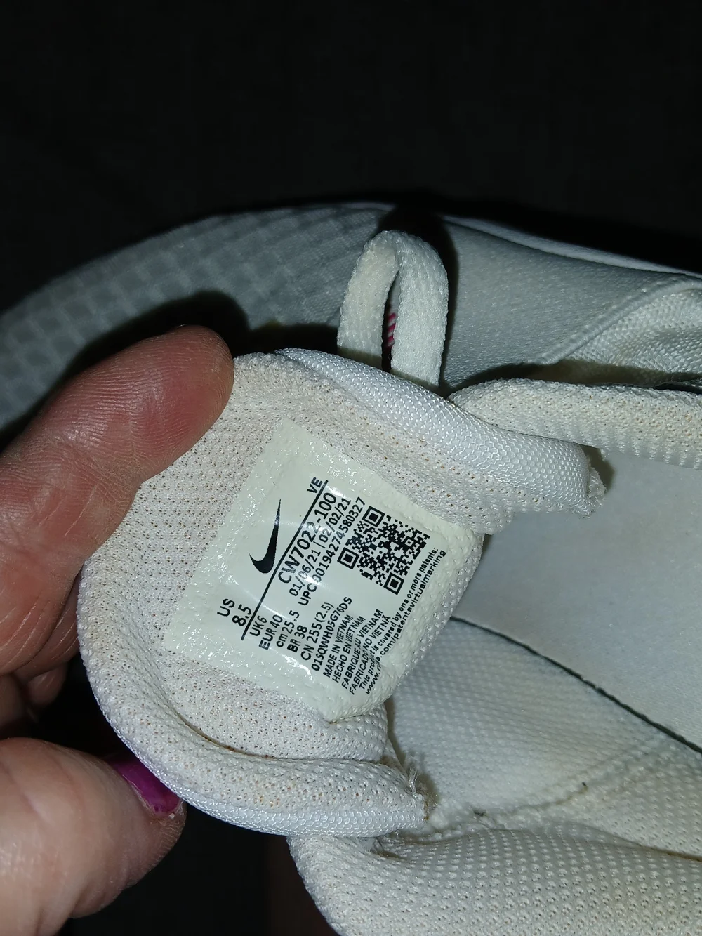 Nike Women’s White Athletic Sneakers with Pink Accents