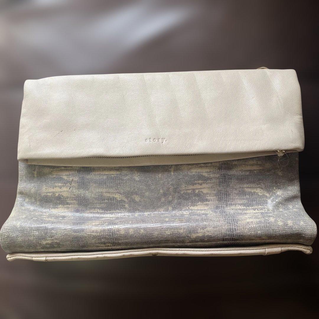 story. Large White Leather Clutch Bag